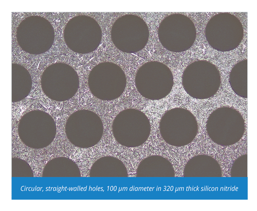 Circular, straight-walled holes, 100 µm diameter in 320 µm thick silicon nitride