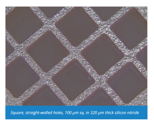 Square, straight-walled holes, 100 µm sq. in 320 µm thick silicon nitride